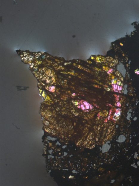 An igneous chondrule in the border of LAP 02342 CR2 chondrite