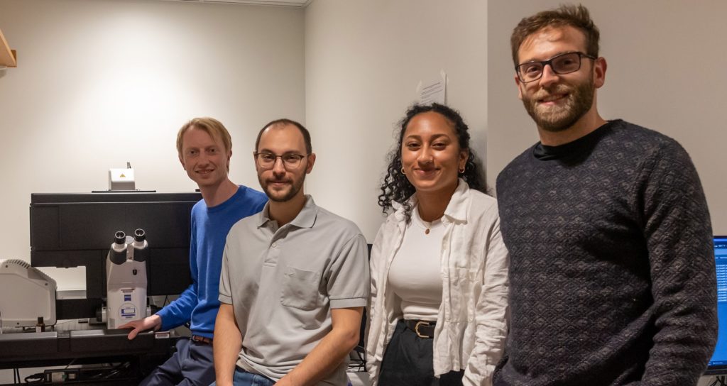 Dr. Anders Sejr Hansen (far left) and lab members (NAMES NEEDED).